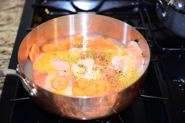 place salmon into pan